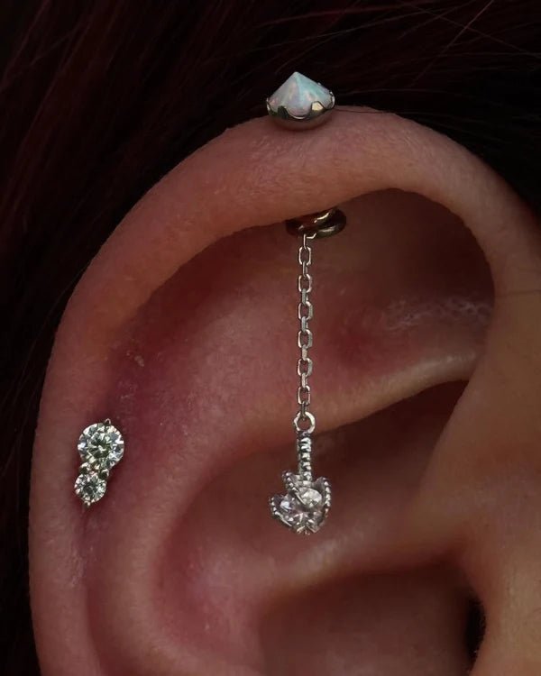 Model wearing Aman Duo CZ End in Helix Piercing
