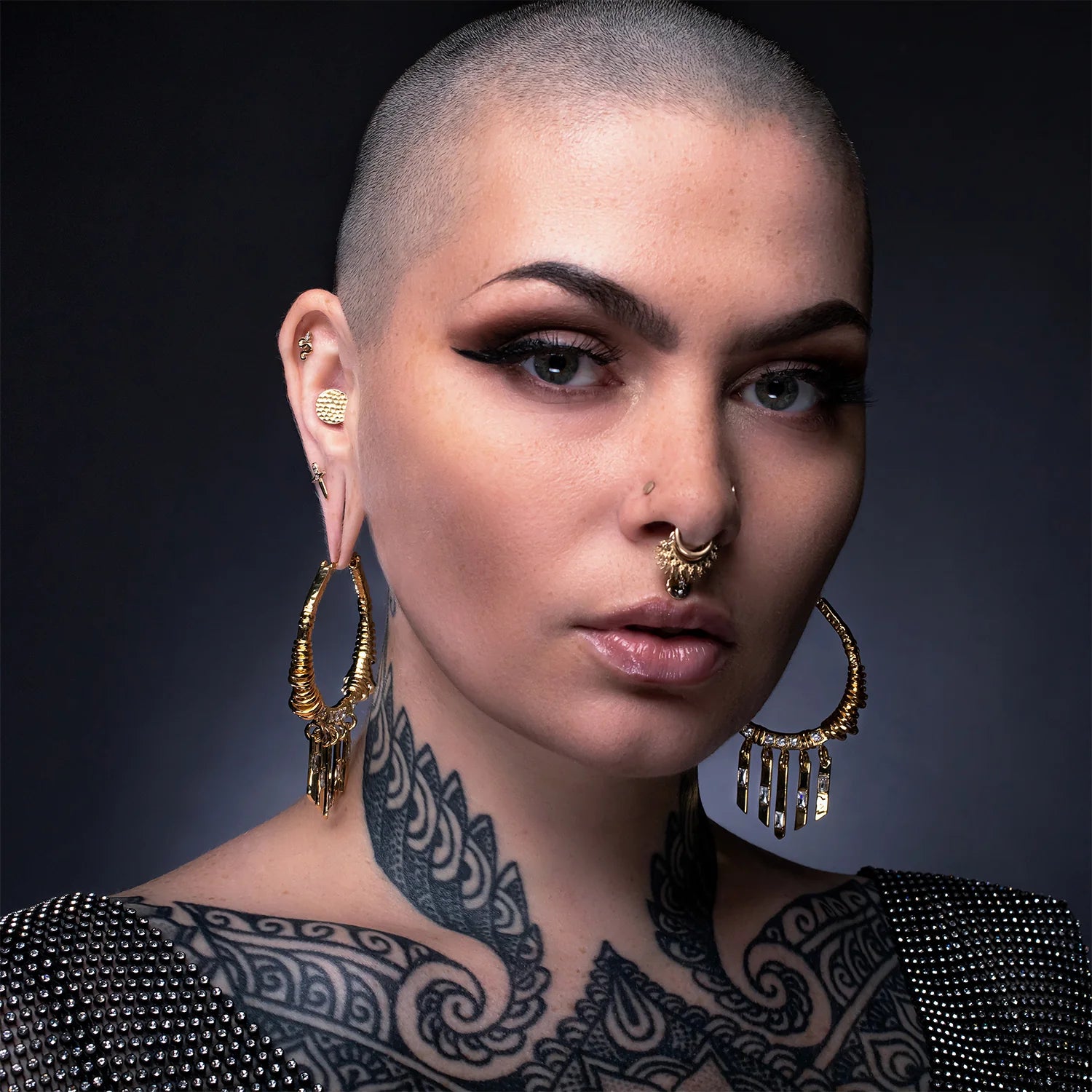 Hand-crafted 11mm gold sword end for ear or flat piercings