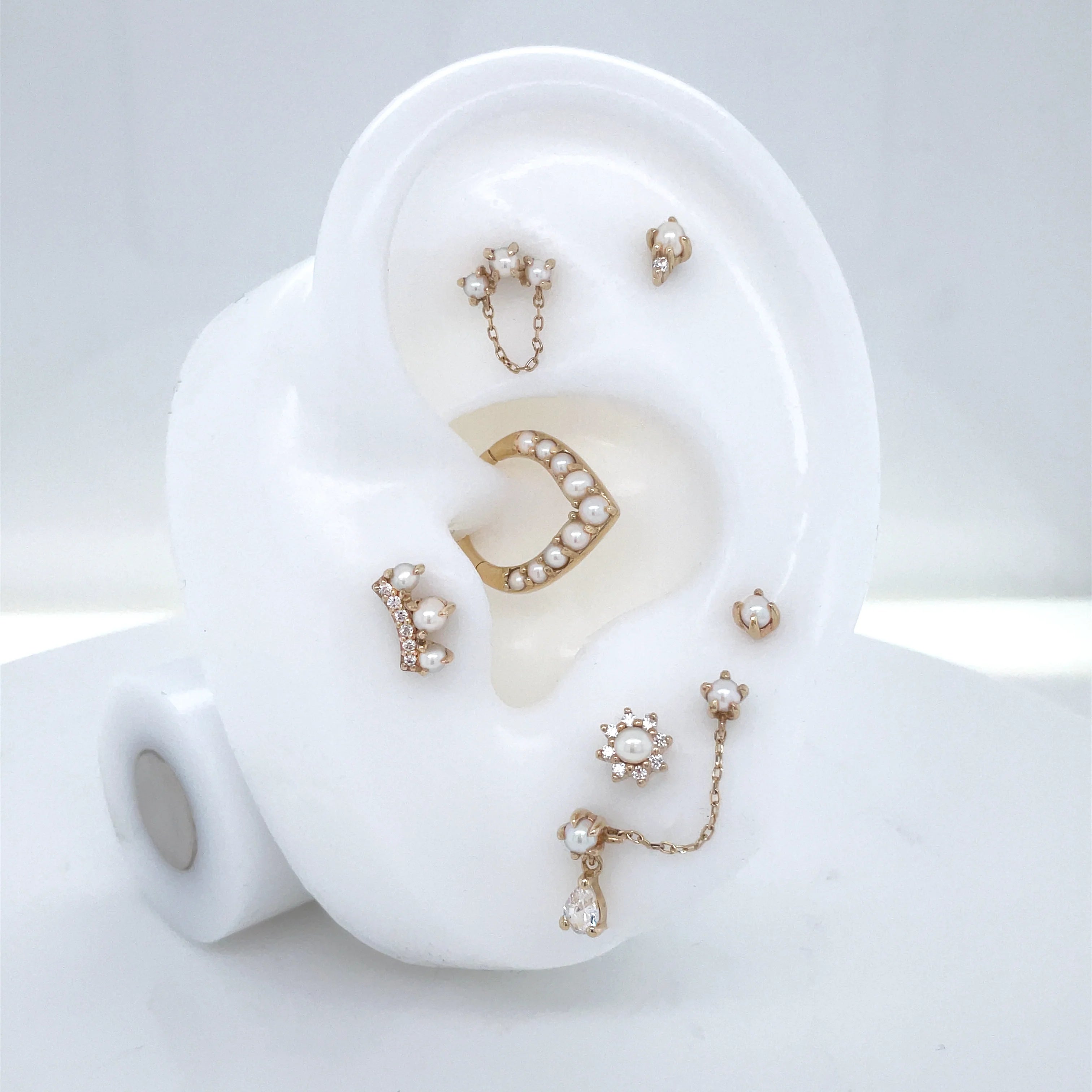 Model Wearing The Obsession in Helix Piercing – Romantic Glow

