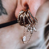 MOET CHARM 14KT SOLID GOLD + WHITE TOPAZ piercing-zone.com