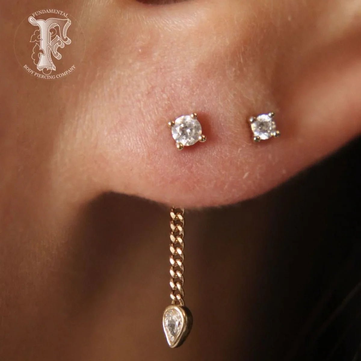 Pear-Cut Swarovski CZ Hanging on Gold Chain – Macro Detail

