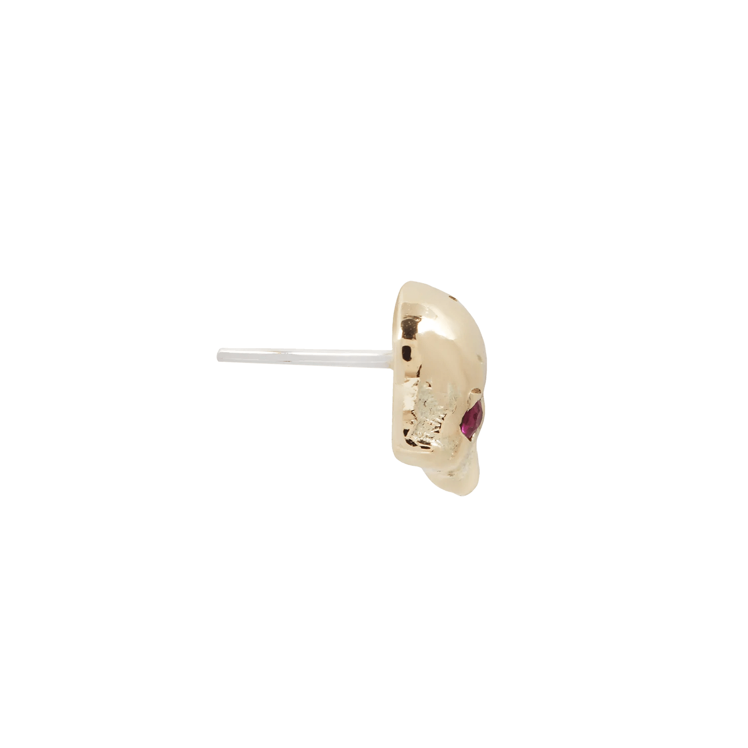 Small gold skull piercing end with two natural rubies

