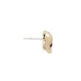 Small gold skull piercing end with two natural rubies

