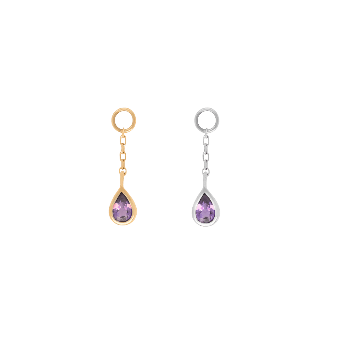 Side view of 14k gold Concorde charm – sleek and elongated piercing accessory