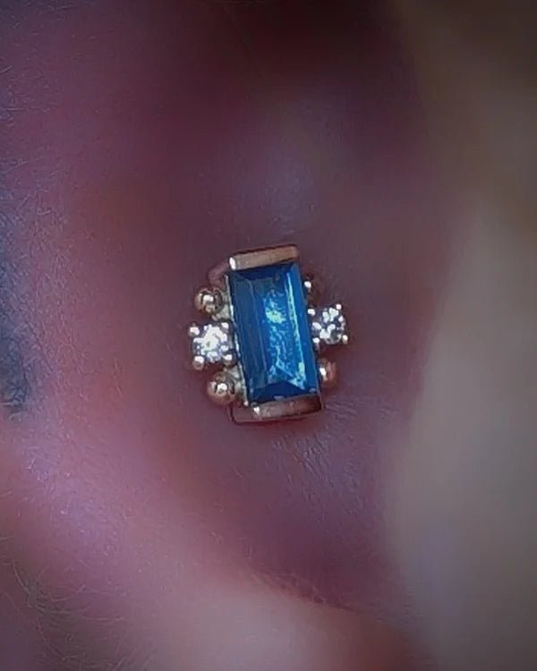 Model wearing Tina end in helix piercing – Lifestyle shot