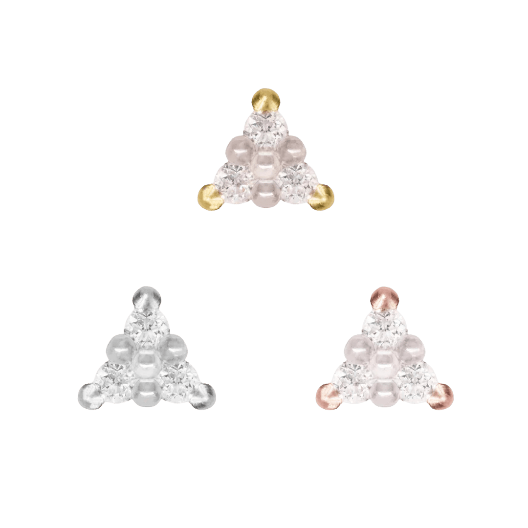 Close-up of Vibe threadless jewelry – faceted diamonds and polished gold

