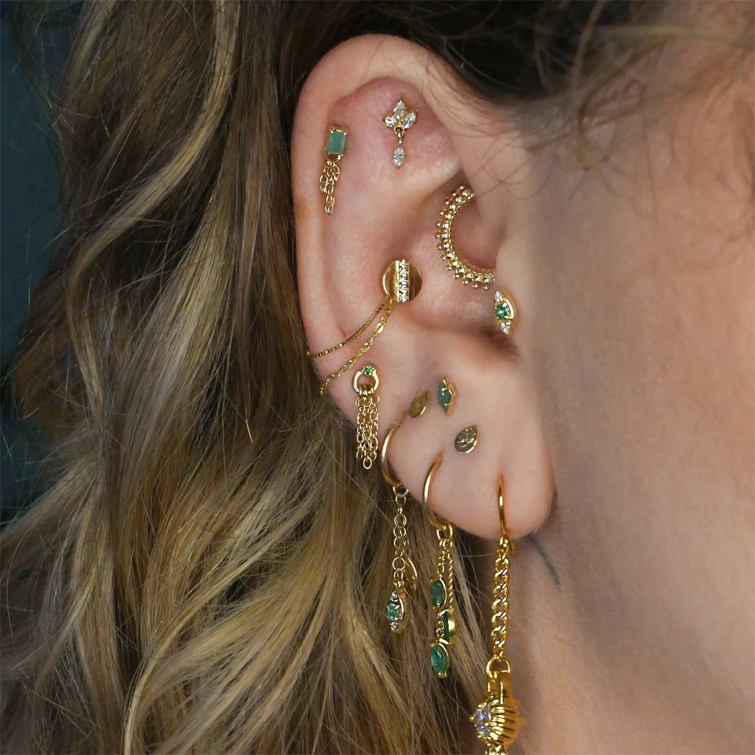 5.5mm gold disc piercing with crystal inlay