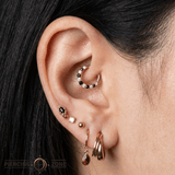 Eclipse – Black Spinel & CZ Clicker – 14K Gold Celestial Ring - piercing - zone.com