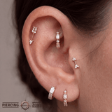 Euphoria – 14K Gold White Sapphire & CZ Huggie Clicker - piercing - zone.com