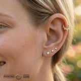 Gayana Clicker with Mixed Gem Sizes – 14K & 18K Gold - piercing - zone.com