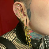 Petite gold heart piercing end with protective chain design
