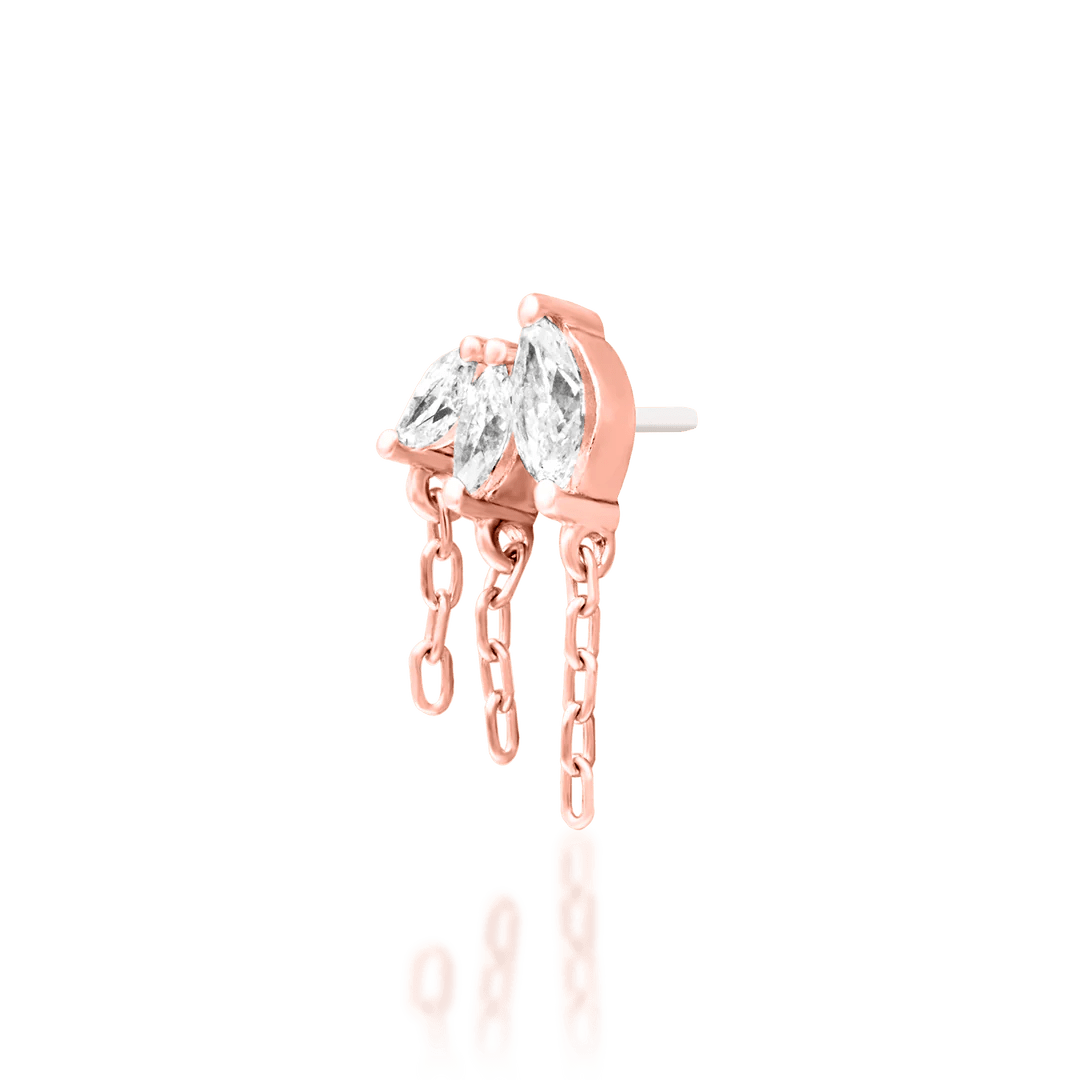 Infamous styled in flat piercing – bold chain drop with diamond shimmer