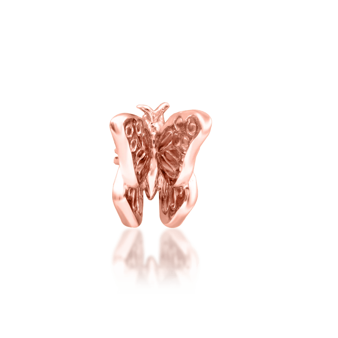 Sculptural butterfly design in solid 14K rose gold – close-up angle