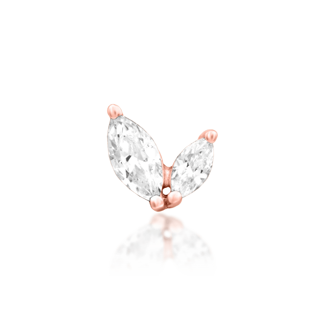 Side profile of Ocie in rose gold – dainty and sculptural gold silhouette