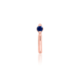 Vast piercing end in rose gold – elegant deep blue sapphire profile