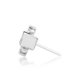 Tina threadless end on jewelry tray with conch and flat piercing jewelry – lifestyle composition