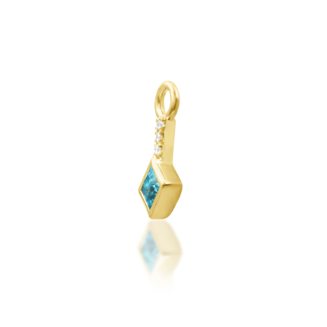 Front view of Anna-May jewelry – cascading blue stones in gold setting