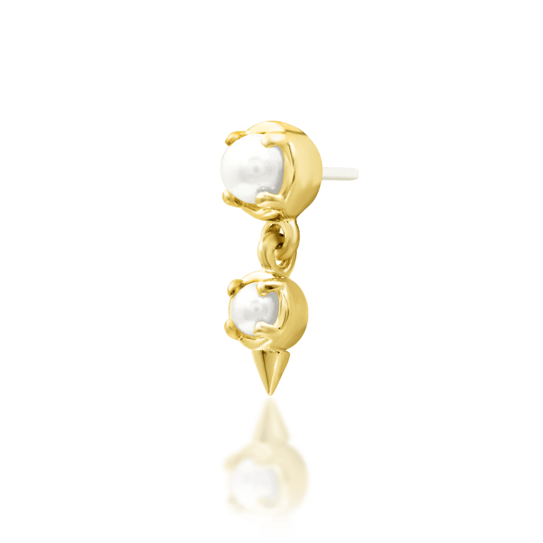 Elegant vertical gold piercing jewelry featuring pearls