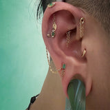 Close-up of Solstice piercing end with symmetrical stones