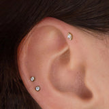 Minimalist gold piercing jewelry for curated ears